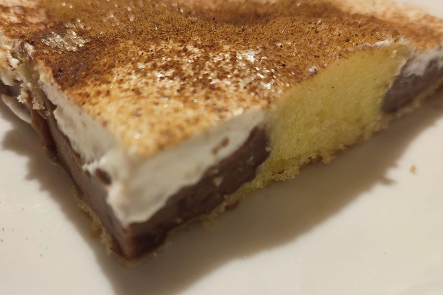 Obrázek receptu na Pudinkovou buchtu se zakysanou smetanou a skořicí, lahodný dezert na neděli